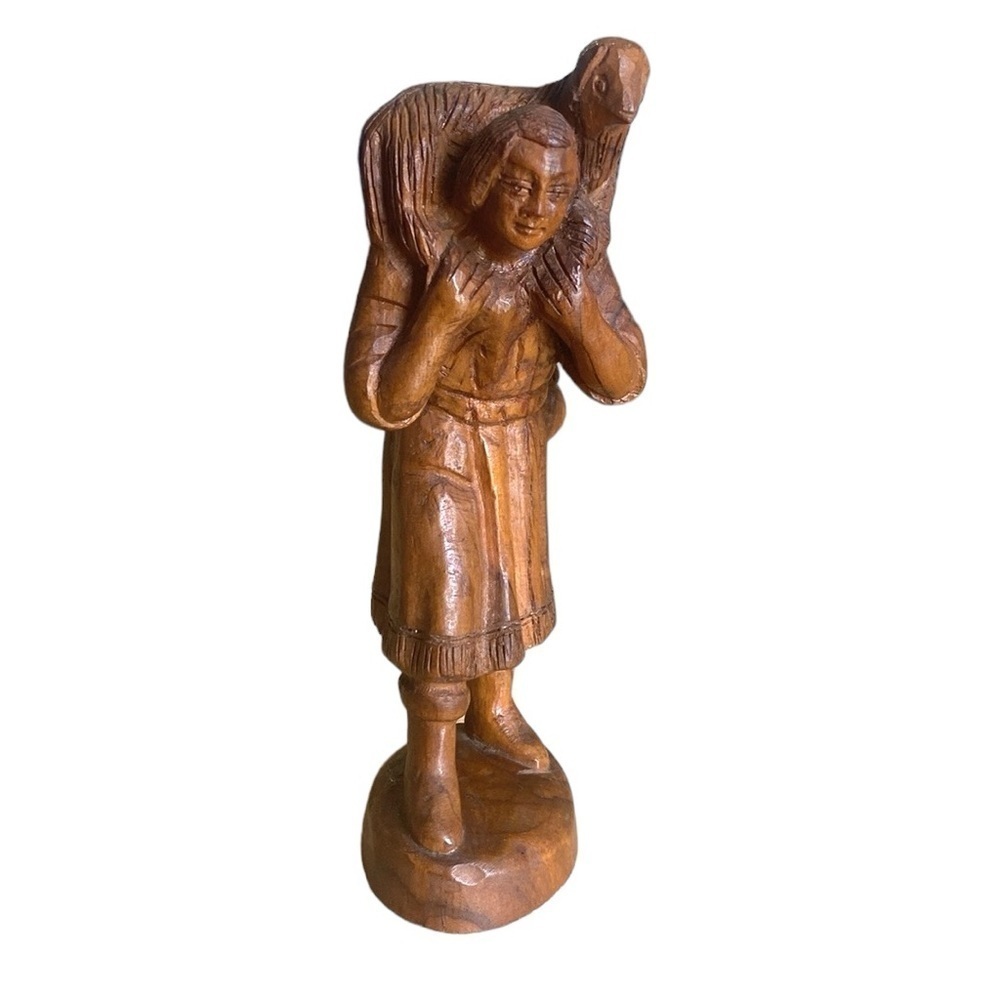 Hand carved wooden statue shepherd with sheep on shoulders bible David